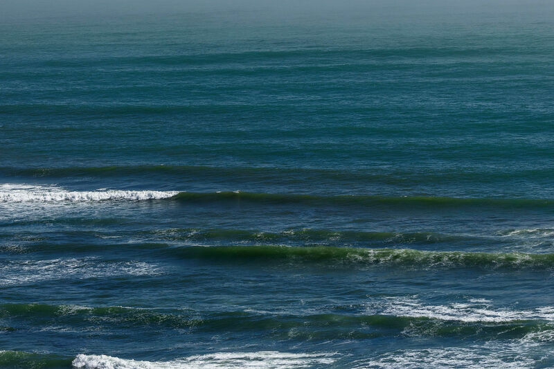 Empty waves, misty Atlantic horizon