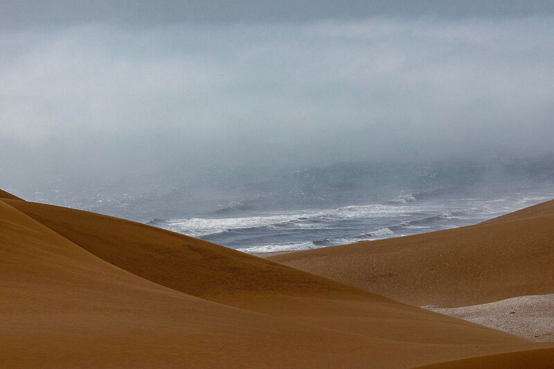 Misty sand dune in fog, Namib